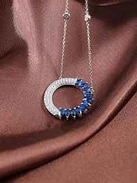 Колье из золота с бриллиантами и сапфирами